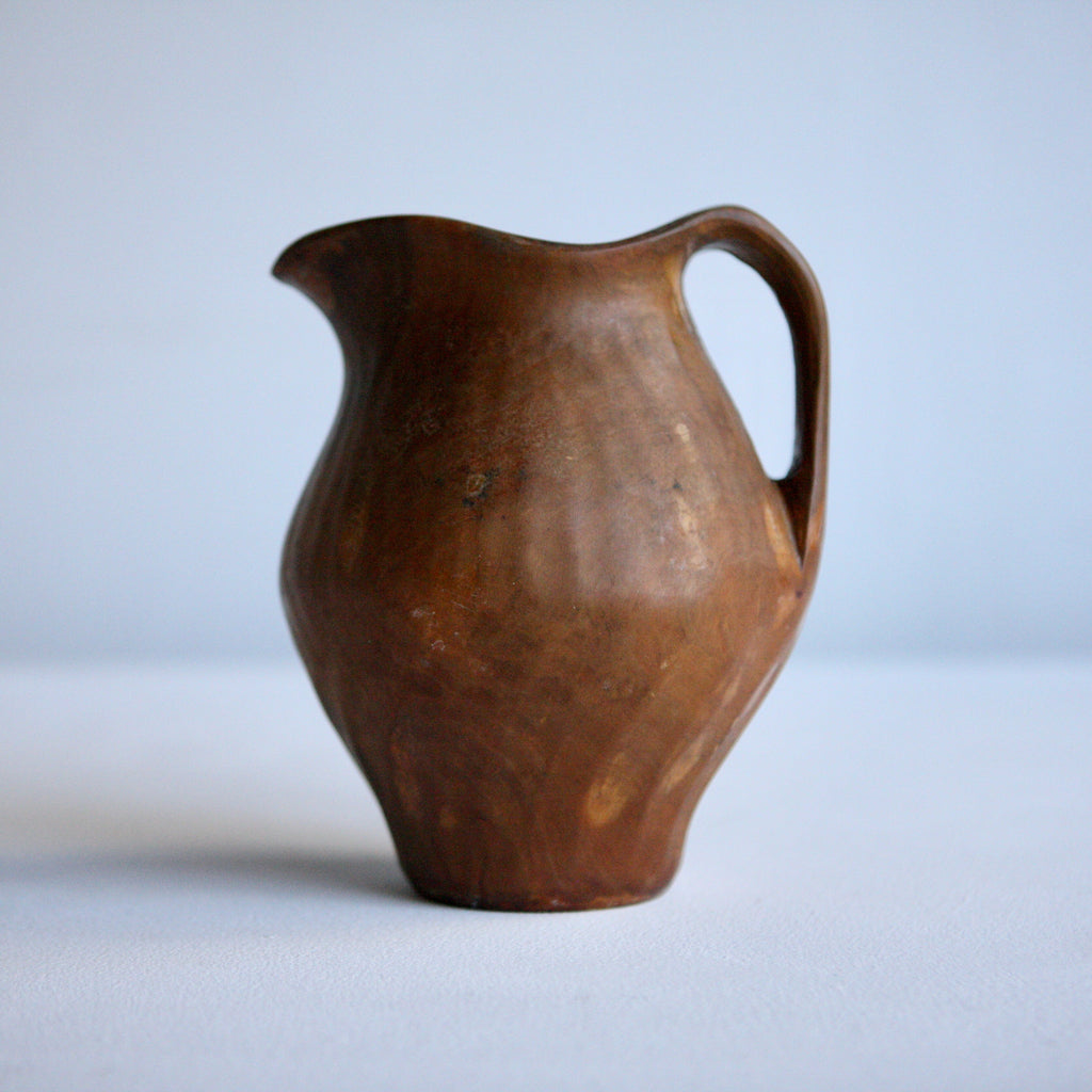 Carved Wooden Jug