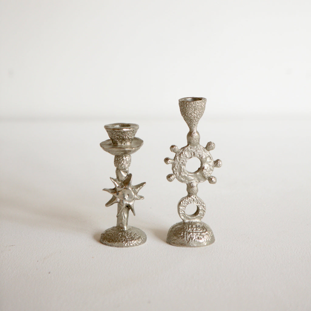 Pair of Cast Aluminium Candlesticks