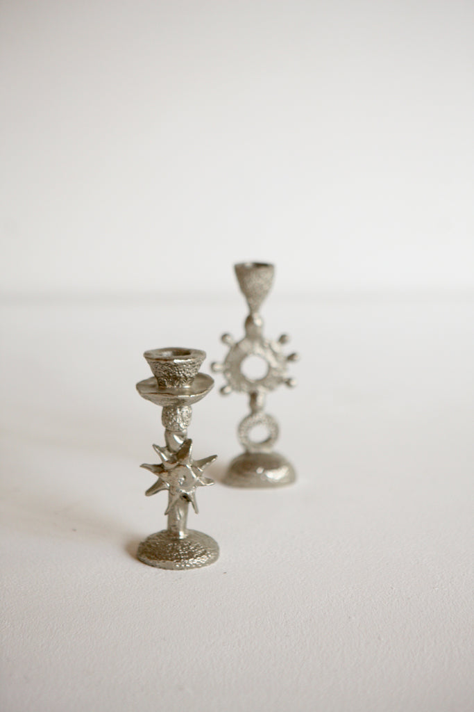 Pair of Cast Aluminium Candlesticks