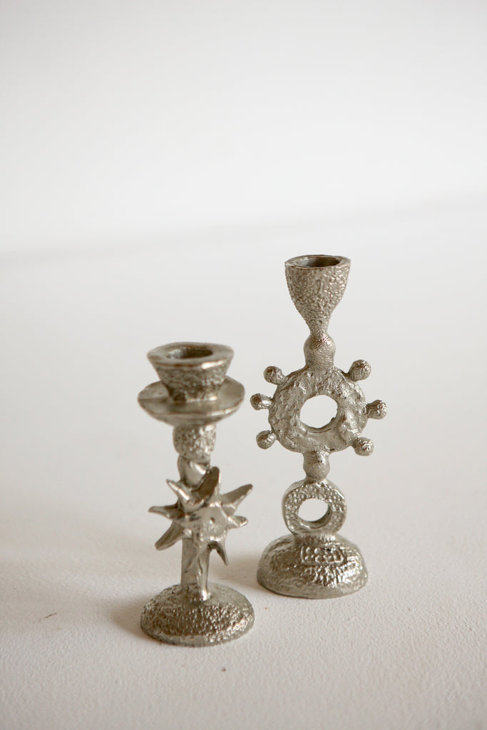 Pair of Cast Aluminium Candlesticks